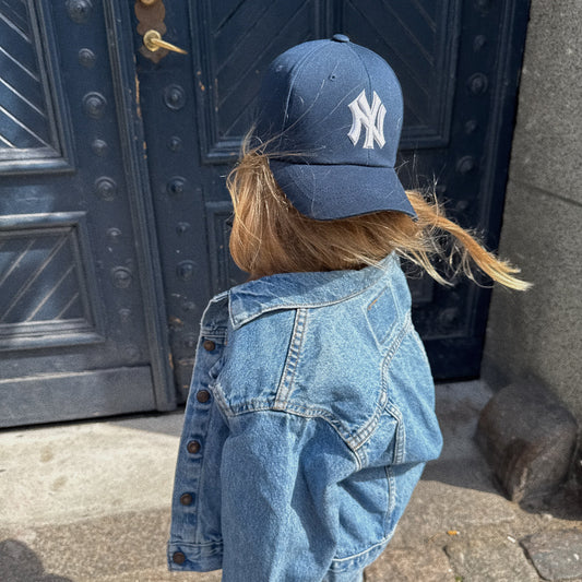NY cap